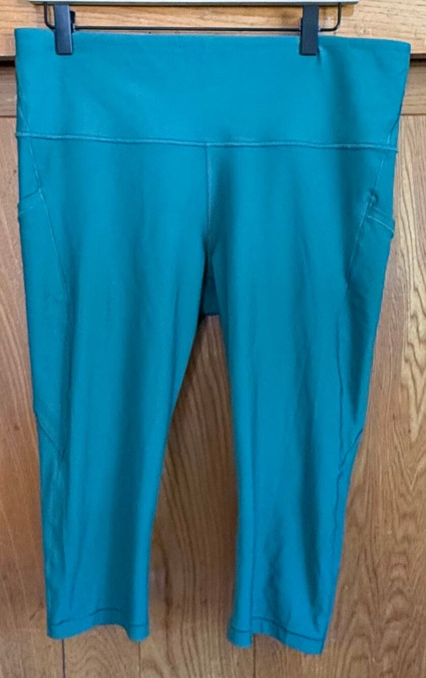 Athleta Interval Stash Capri Leggings Teal Green Size XL